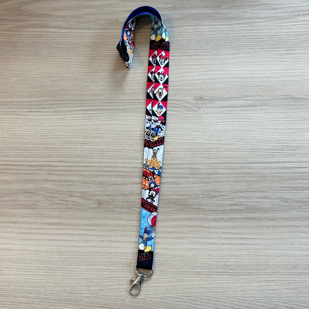 A Disney pin trading lanyard photographed for a US resale marketplace listing in September 2026